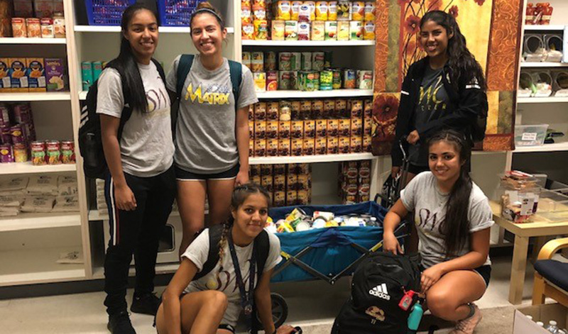 Women's soccer donates to jag kitchen